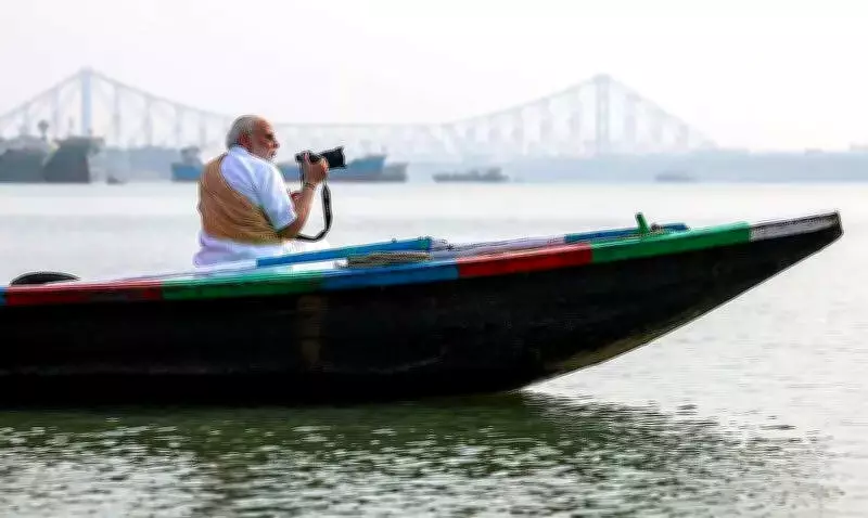 PM Modi takes early morning boat ride on Ganges in Kolkata, interacts with boatmen