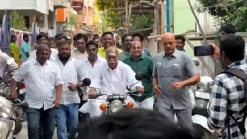 Puducherry CM Rangasamy Rides Motorcycle to Cast Vote in 2026 Elections