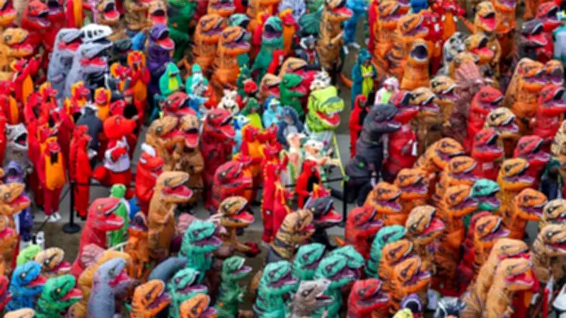 University of Calgary Breaks Guinness Record with 682 Dinosaur Costumes