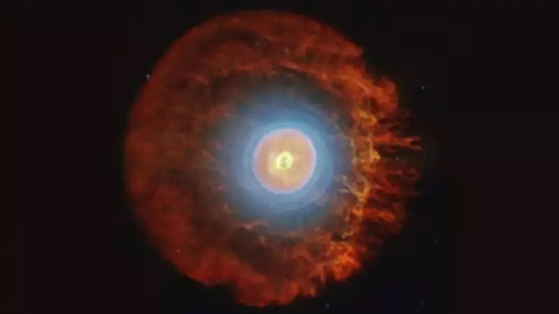 Webb Telescope Reveals Buckyballs and Strange Structures in Dying Star Nebula