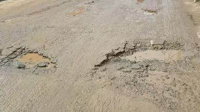 Bengaluru's Choodasandra Residents Grapple with Broken Roads and Open Drains