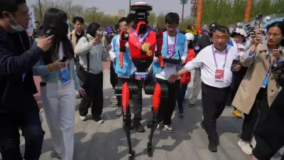 Chinese Humanoid Robots Outrun Humans in Beijing Half-Marathon, Shattering Records