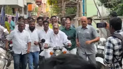 Puducherry CM Rangasamy Rides Motorcycle to Cast Vote in 2026 Elections