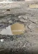 Greater Noida Residents Demand Urgent Road Repairs Amid Safety Concerns