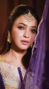 Koushani Showcases Desi Elegance in Stunning Purple Ensemble