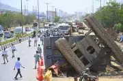 Mumbai Constable Killed as Excavator Crane Topples on Motorcycle at Flyover Site