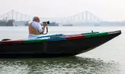 PM Modi takes early morning boat ride on Ganges in Kolkata, interacts with boatmen
