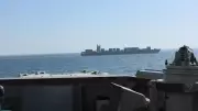 US Navy Intercepts Iranian Cargo Ship in Strait of Hormuz, Iran Retaliates with Drones