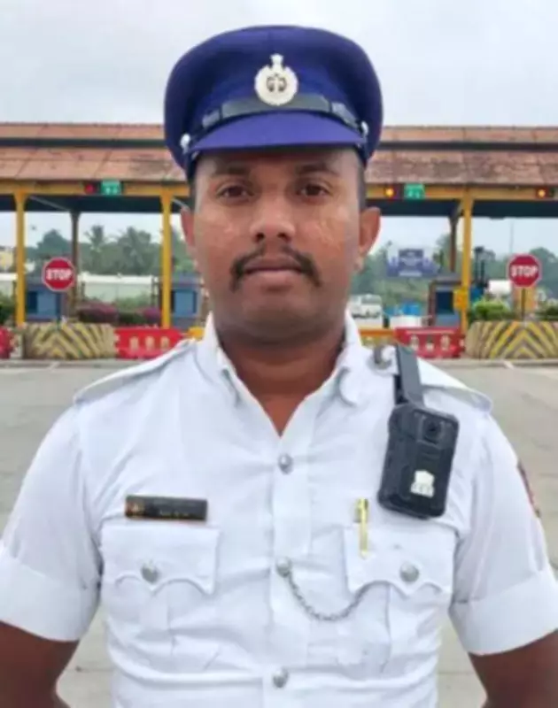 Bengaluru Traffic Cop Wins Hearts for Carrying Disabled Man Through Waterlogged Road