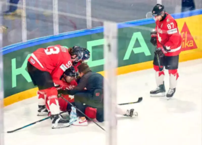 Canada's Evan Bouchard Injured by Ryan Lindgren's Hit in World Championship Quarterfinal