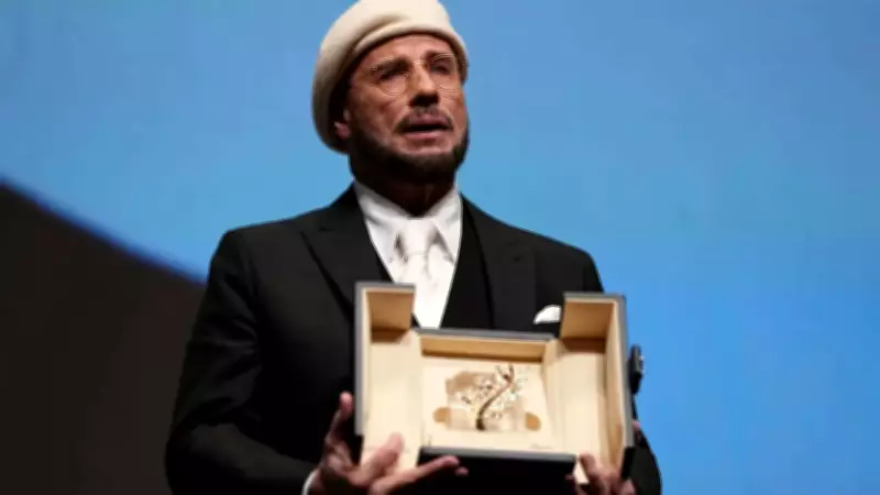 John Travolta Surprised with Honorary Palme d'Or at Cannes Premiere