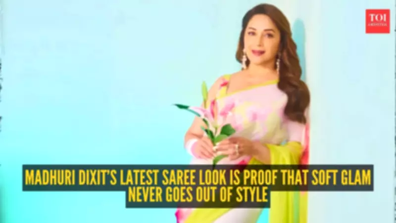 Madhuri Dixit Stuns in Yellow Saree at Her Film Trailer Launch