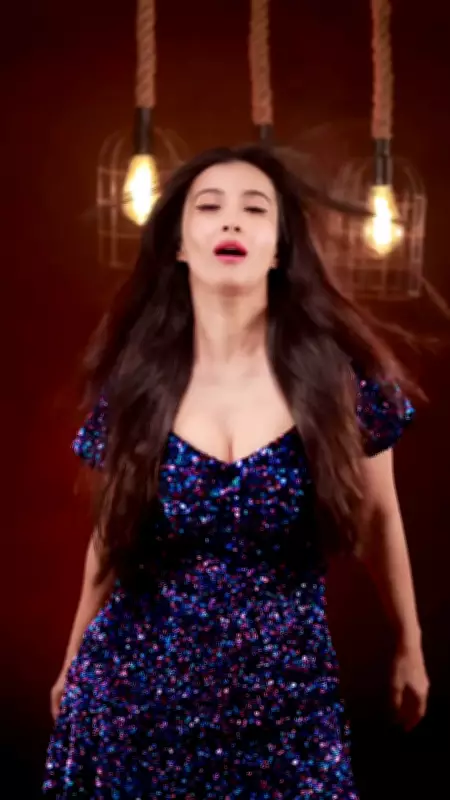 Monami Ghosh Stuns in Shimmering Outfit with Sass and Style