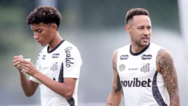 Neymar clashes with Santos youngster Robinho Junior in training