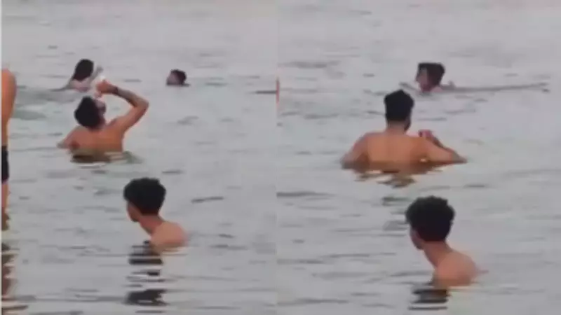 Youth Booked for Drinking Beer While Bathing in Ganga, Video Viral