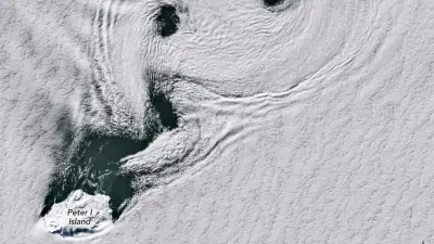 NASA Captures Stunning Spinning Clouds Over Antarctica's Peter I Island