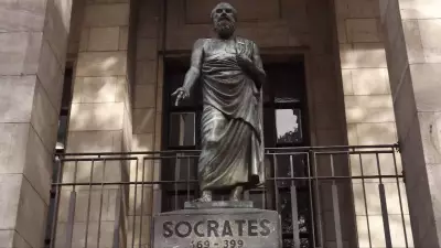 Socrates Quote on Strong Minds Discussing Ideas Still Relevant Today