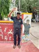 76-Year-Old Security Guard Honored with Mural at Udupi Hotel