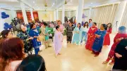 Artistic Children Walk Hand in Hand with Mothers in Heart-Warming Celebration