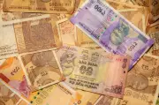 Indian Rupee Hits All-Time Low of 96.7 Against US Dollar