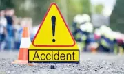 Man Escapes Unhurt as Car Falls into Drain in Pathankot