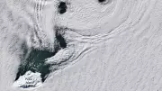 NASA Captures Stunning Spinning Clouds Over Antarctica's Peter I Island