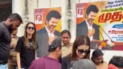 Trisha Krishnan Accidentally Poses Next to Thalapathy Vijay Poster