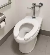 Why Public Toilet Seats Have a U-Shape: Hygiene and Plumbing Code Explained