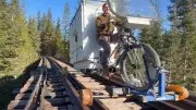 YouTuber Travels 100 Miles on Abandoned Railways in DIY E-Bike Camper