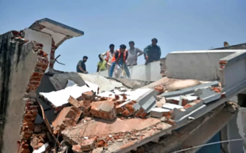 AMC Demolishes Illegal Extensions in Ahmedabad Amid Protests