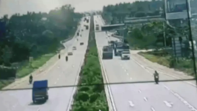 CCTV Captures Truck Crashing Through Median on Bengaluru Highway