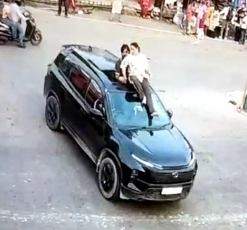 Couple Booked for Dangerous Stunt on Moving SUV in Himachal's Dehra