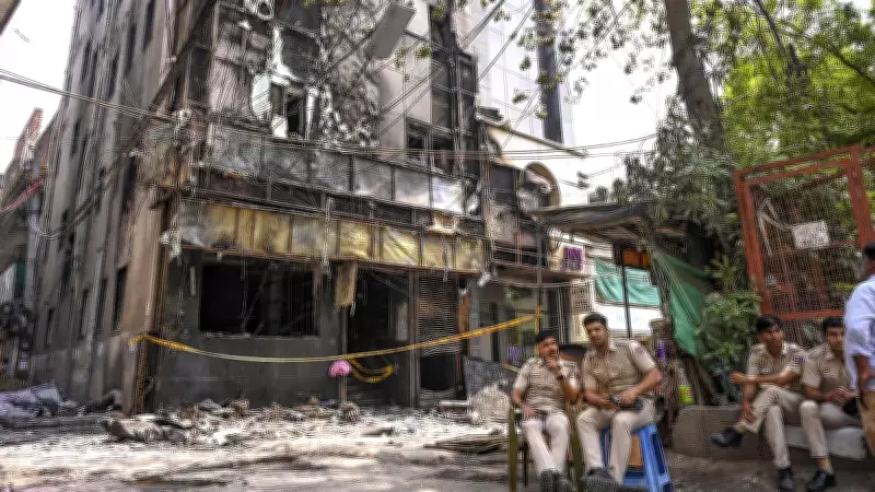 Delhi Fire Victim's Family Searches for Missing Belongings