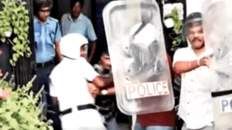 Kolkata police use riot shields to protect Trinamool councillor from egg protest