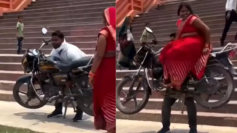 Man Arrested for Reckless Motorcycle Stunt with Wife at Temple Ghat