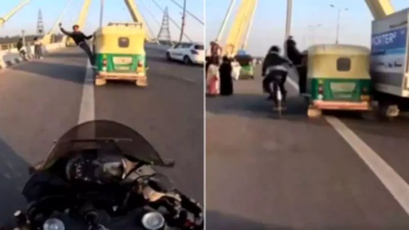 Man Hanging Out of Speeding Auto While Shooting Reel Crashes Into Cyclist: Viral Video