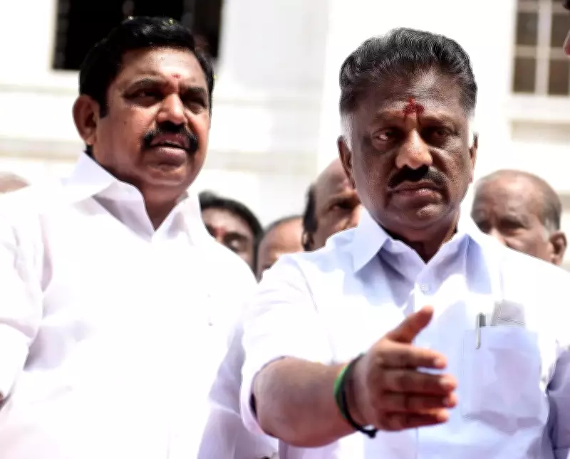 OPS and EPS withdraw all pending cases against each other in Madras HC