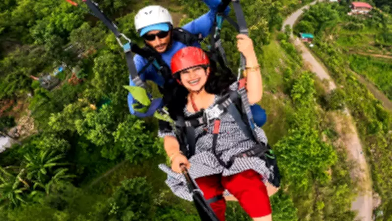 Paragliding pilot plucks leaves mid-flight to impress female passenger, video goes viral