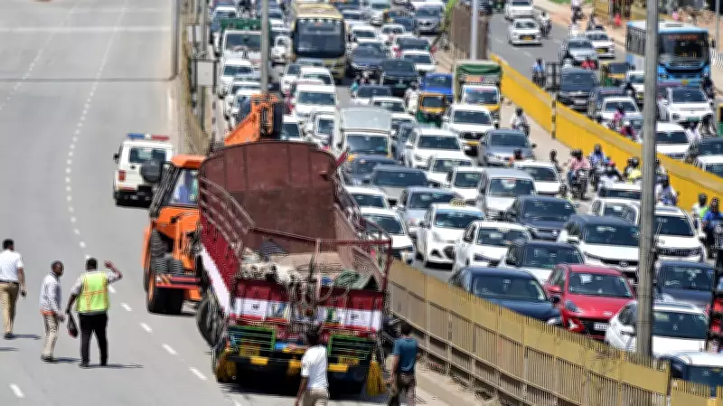 Rice-Laden Lorry Overturns Near Hebbal Skywalk, Disrupts Traffic for Three Hours