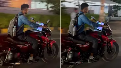 Telangana Biker Uses Laptop While Riding Through Traffic, Viral Video Sparks Outrage