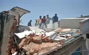 AMC Demolishes Illegal Extensions in Ahmedabad Amid Protests
