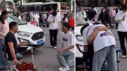 Gaokao Student Kneels to Father Chen Zhou, A Disabled Motivational Speaker