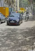 Haralur Road Woes: Bengaluru Commuters Brave Potholes, Sewage Daily