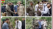 Indian and Pakistani Army Officers Shake Hands During Repatriation Along LoC