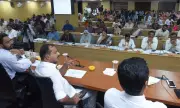 Karnataka Health Minister Warns Arogya Mitras Over Cashless Treatment Issues