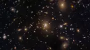 NASA's Hubble Captures Densely Packed View of Galaxy Cluster MACS0329-0211