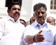 OPS and EPS withdraw all pending cases against each other in Madras HC
