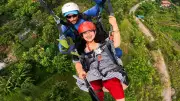 Paragliding pilot plucks leaves mid-flight to impress female passenger, video goes viral