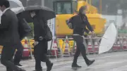 Tropical Storm Jangmi Batters Japan: Power Cuts, Floods, Transport Chaos
