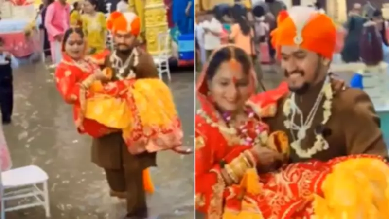 Groom Carries Bride Through Flooded Venue in Indore, Viral Video Wins Hearts
